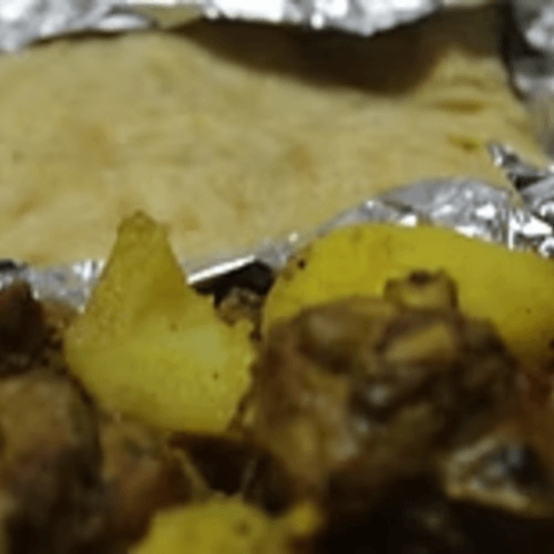 Curry Goat Roti.
