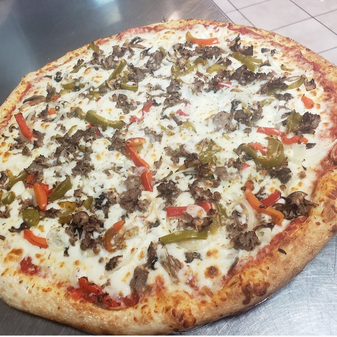 Cheese steak deluxe pizza.