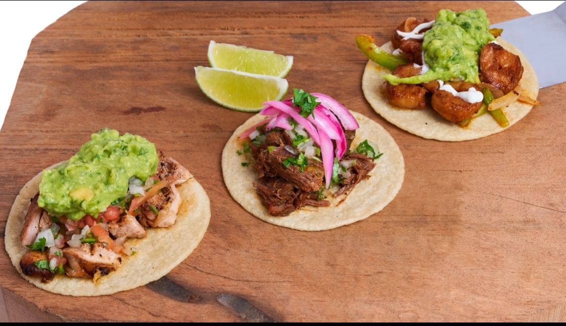 Any 3 Tacos Combo with Rice & Beans.