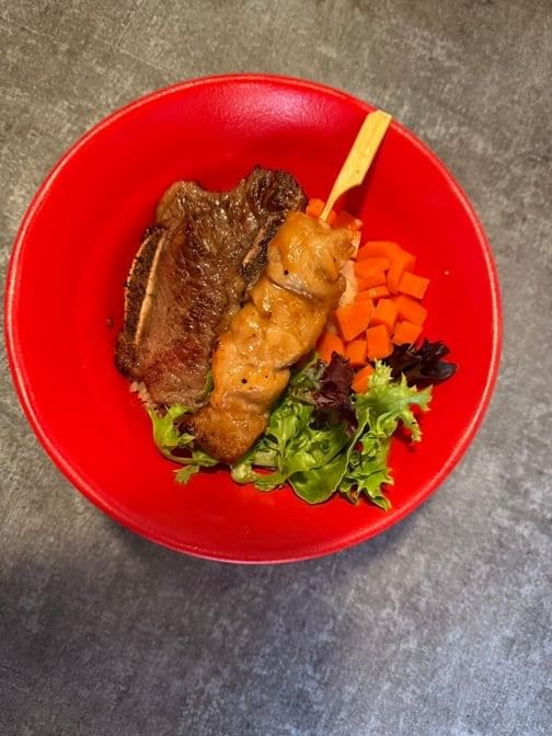 Beef Kalbi and Chicken Skewer Over Rice.