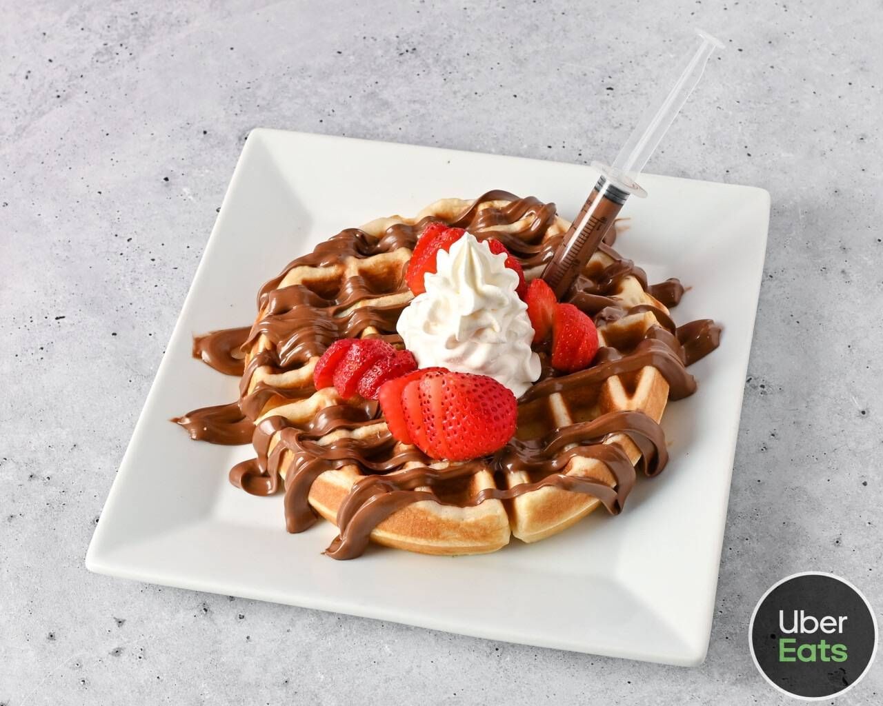 NUTELLA AND STRAWBERRY WAFFLE.