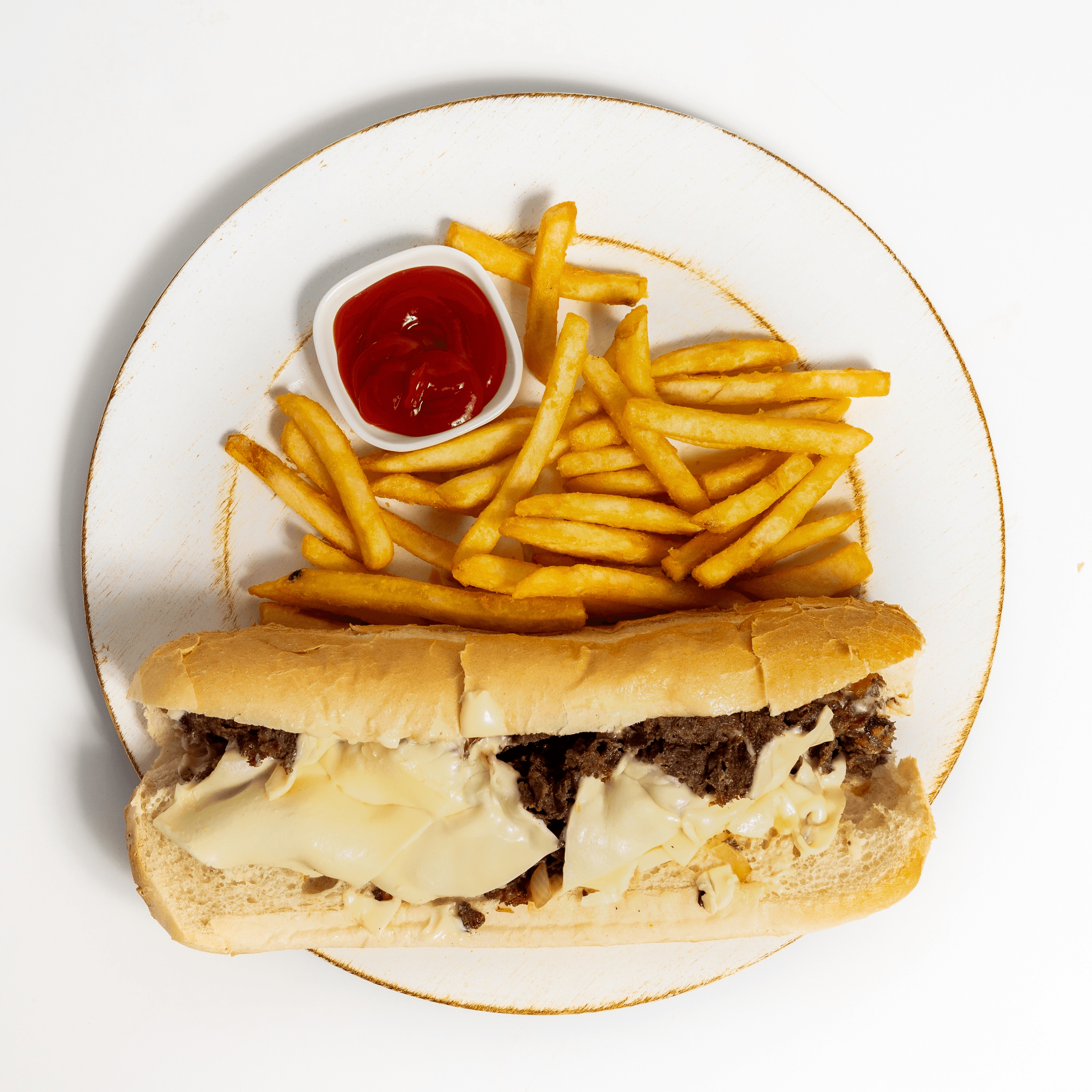 Philly steak sub and chips.