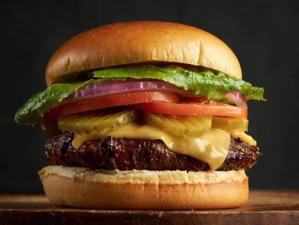 1/2 Lb Cheeseburger Combo Meal (Includes Potato Fries and a Soda).