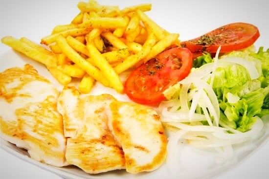 Pollo Asado con Tostones (Salted Plantain Crisps).