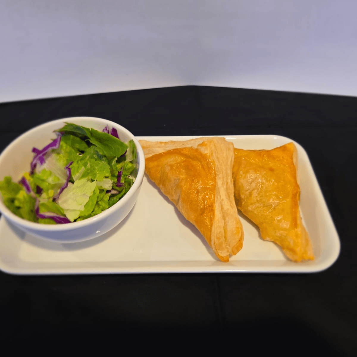 Bengal Chicken Samosa and Green salad.