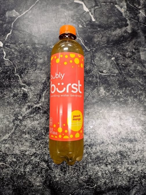 Bubly Burst Peach Mango 16.9 Oz Bottle.