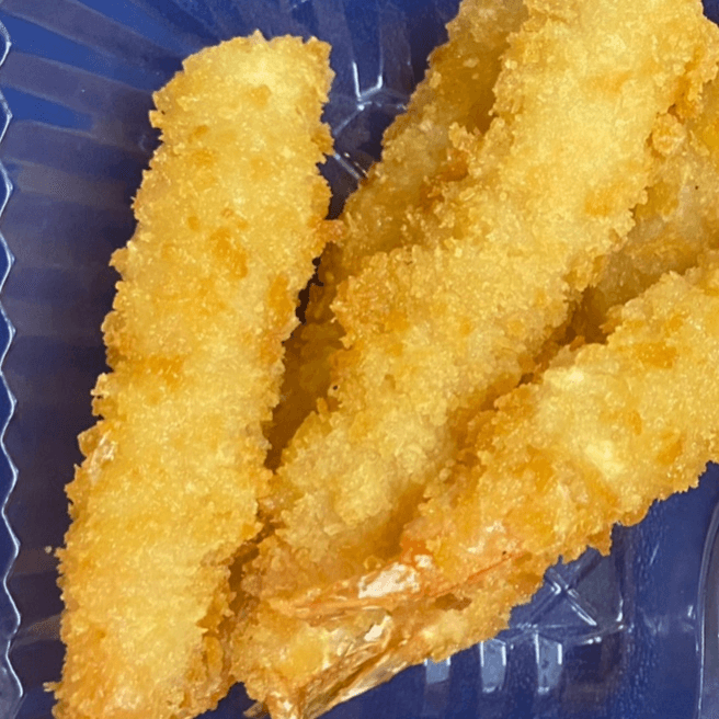 Fried shrimp teriyaki rice meal.