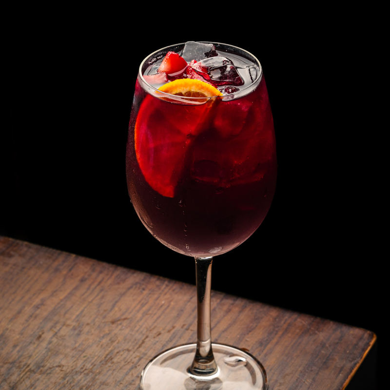 Red sangria with orange and strawberries