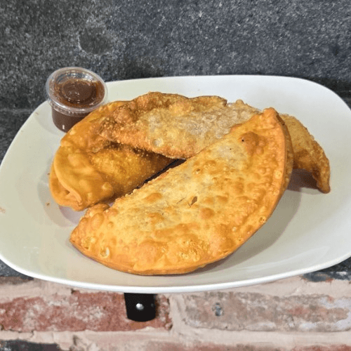 Buy 2 jerk salmon empanadas and get a 3rd for free!.