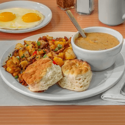 Buttermilk Biscuits, Sausage Gravy, Two Eggs, Bacon, Ham or Sausage
