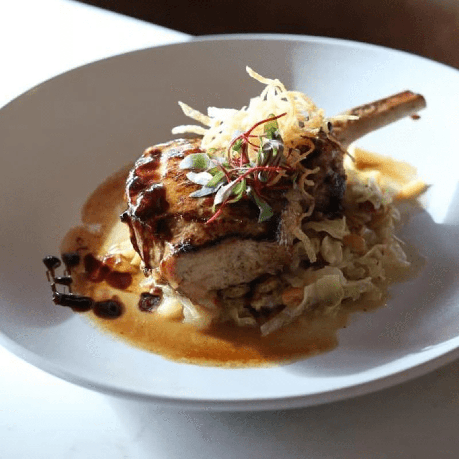 Grilled double-cut pork chop.