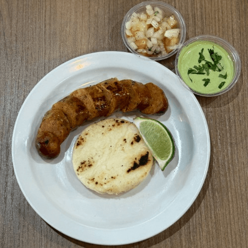 Colombian Sausage with Corn Cake / Chorizo Con Arepa.