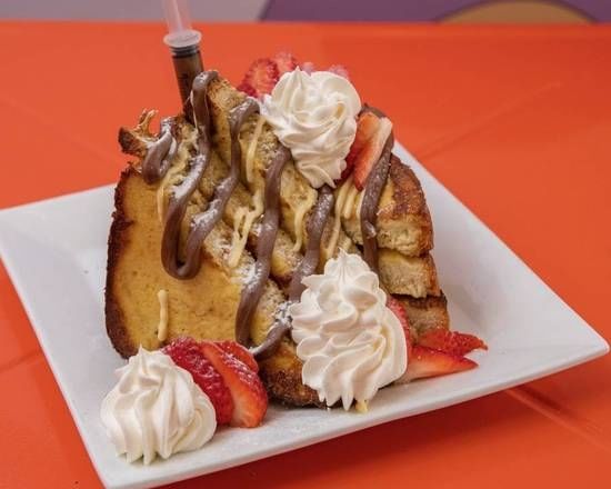 NUTELLA AND STRAWBERRIES FRENCH TOAST.