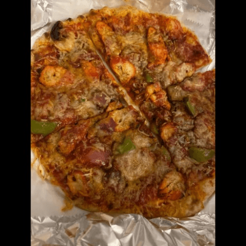 Chicken Tikka Naan Pizza.