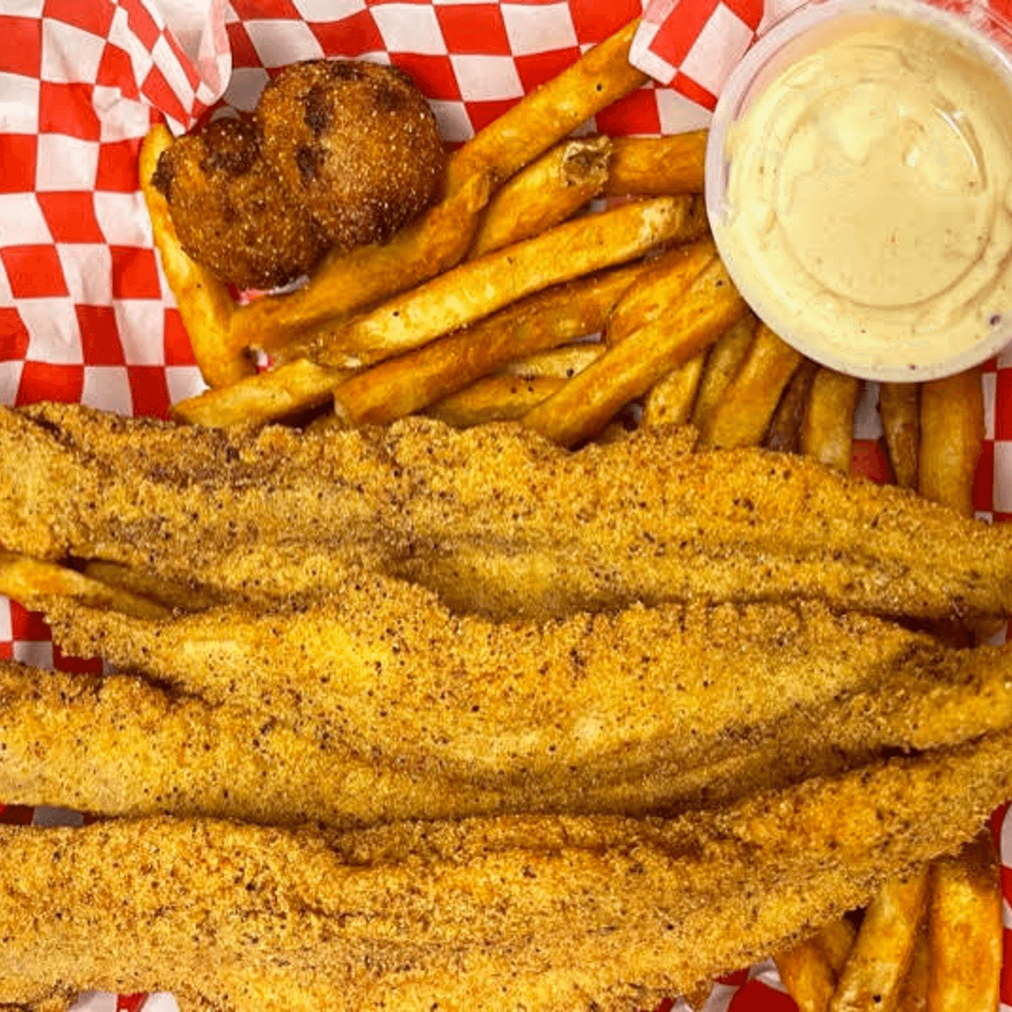 Indulge in Our Signature Catfish Baskets 🔥🐟✨ 