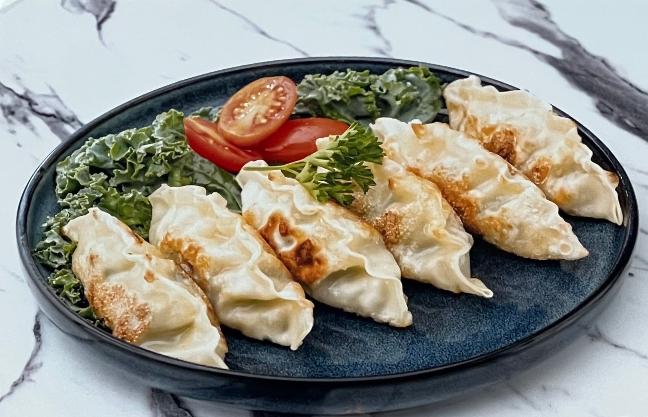 Pork Mandu - 6 Pieces.