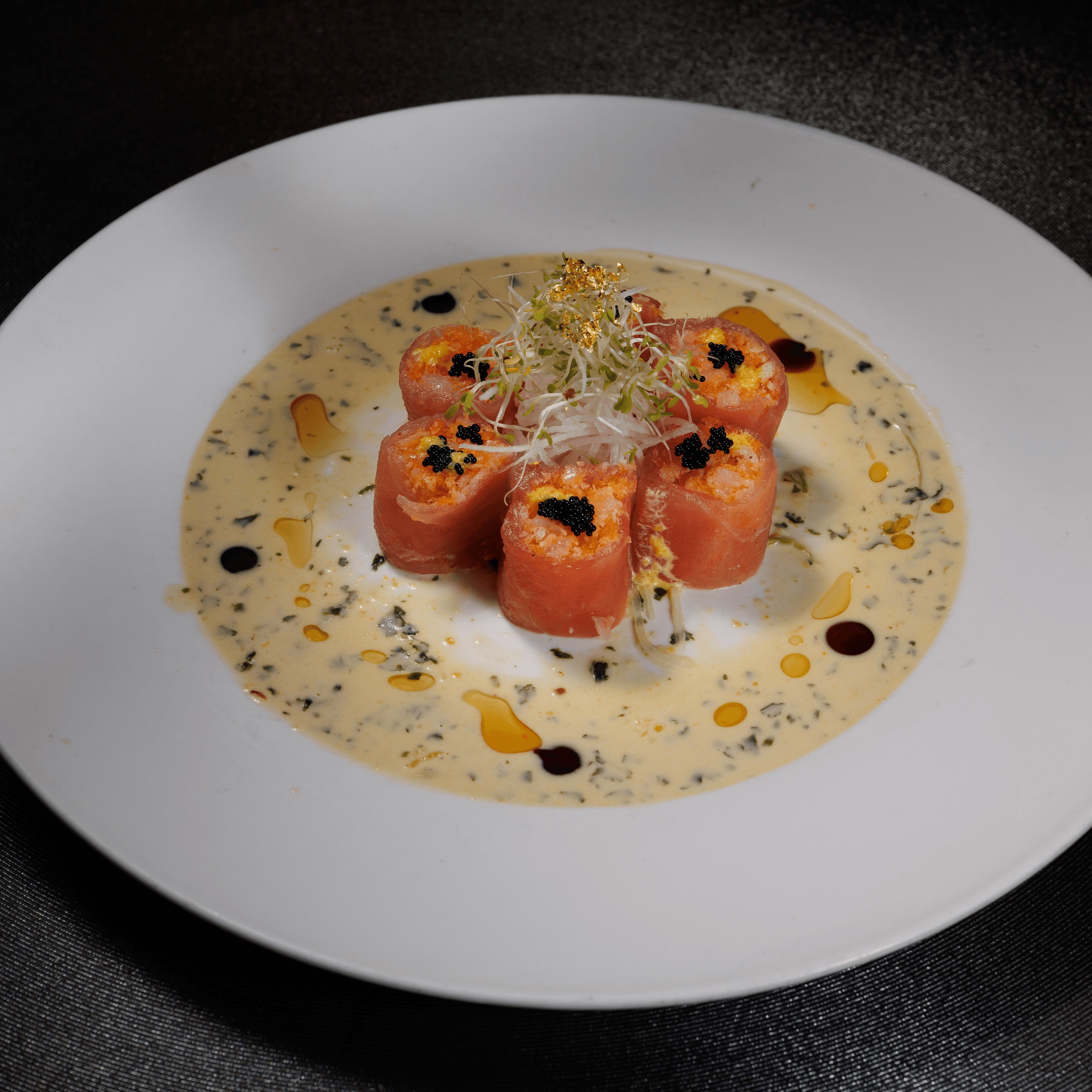 Tuna with gold leaves.