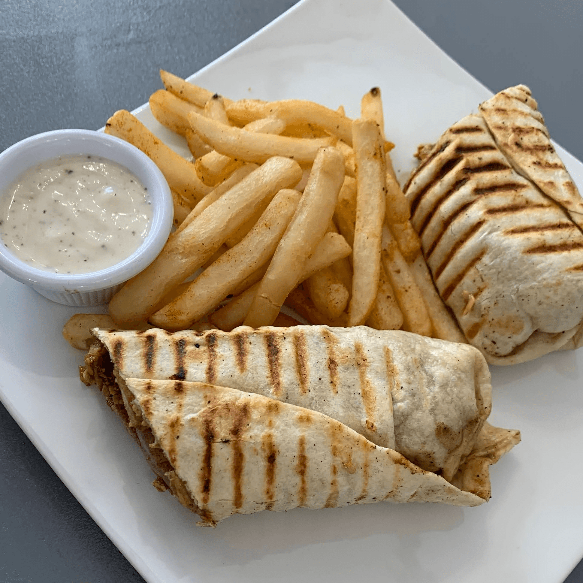 Chicken Shawarma Sandwich with Fries.