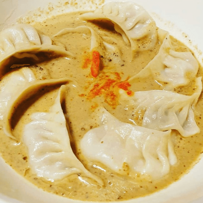 Veggie Jhol Momo.