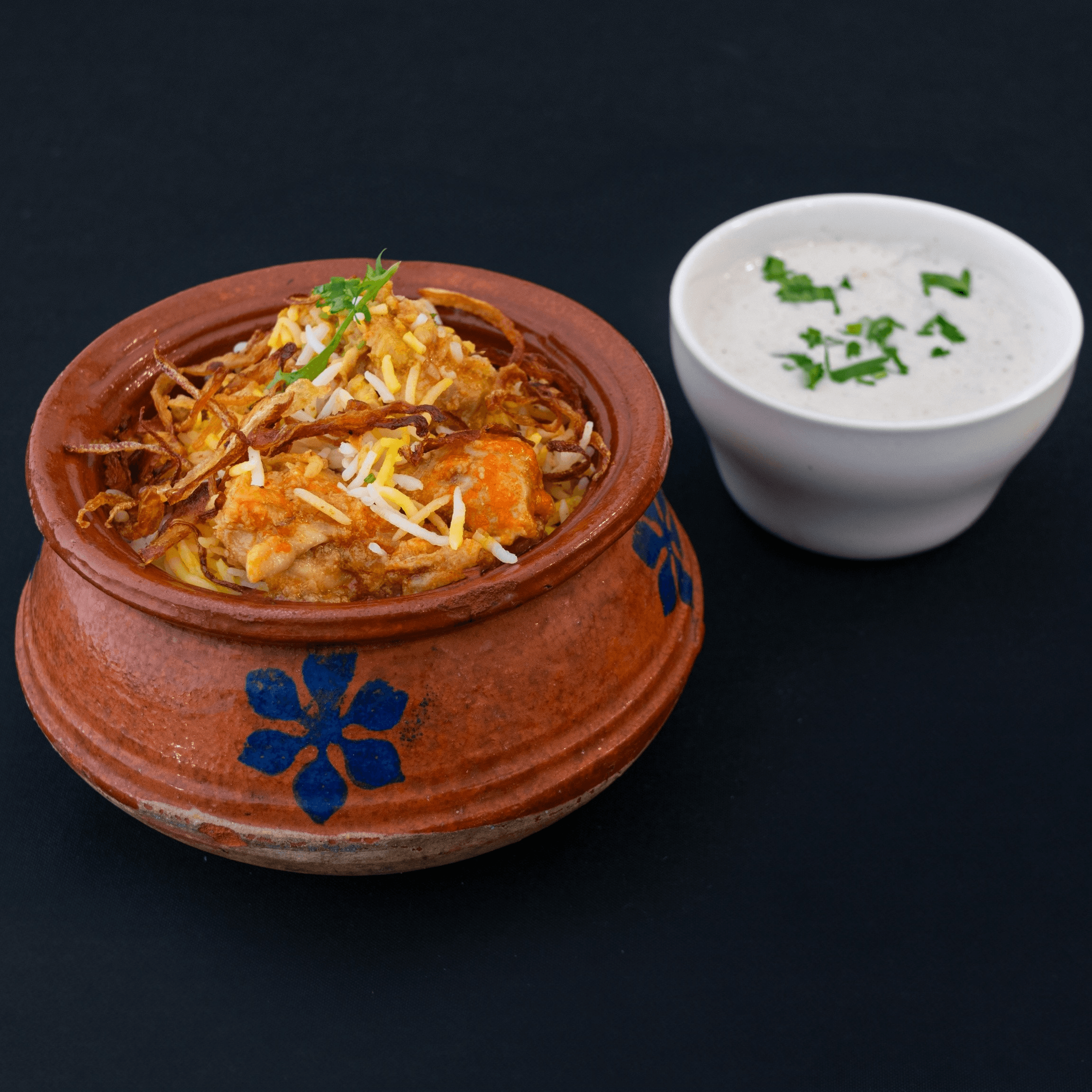 Dum Pukht Chicken Biryani.