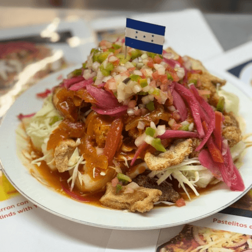 Chicarron Con Yuca/Pork Rind with cassava.