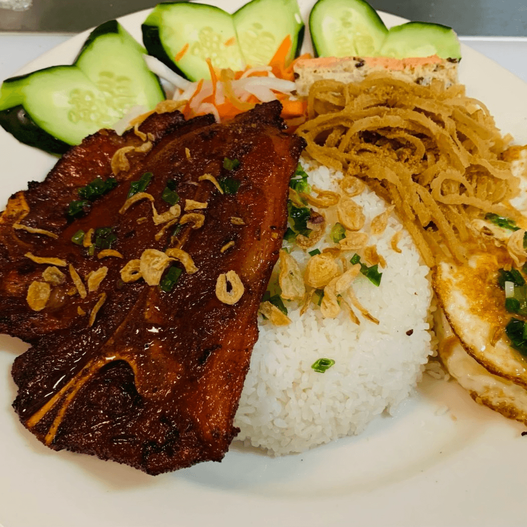 65. Đặc Biệt - Grilled Pork Chop,shredded Pork Skin, Pork Loaf, & 2 Eggs.