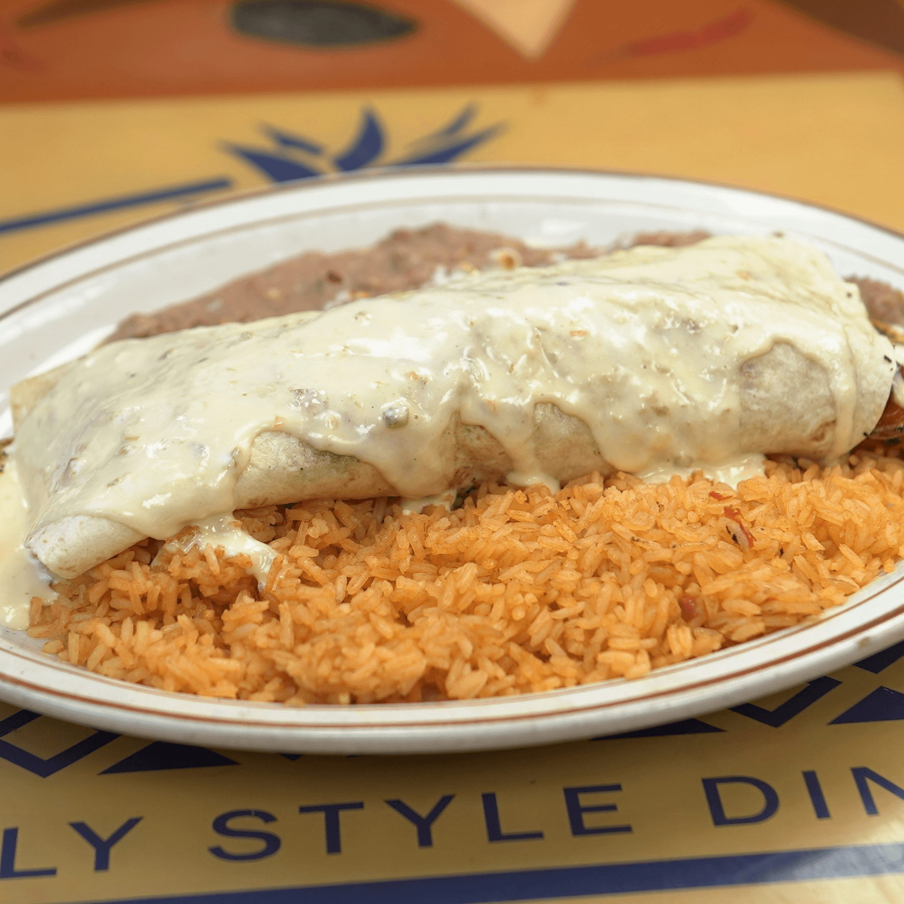 28. Beef or Chicken Burrito with Cheese Dip.