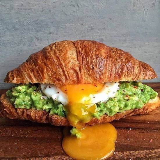 GREEN GODDESS CROISSANT WITH HOME FRIES.