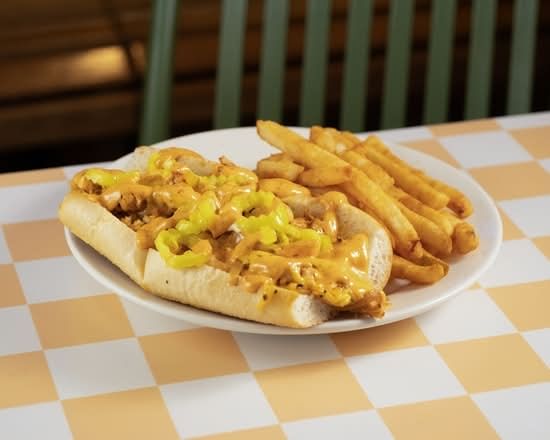 Buzzin Cheesesteak + Fries.