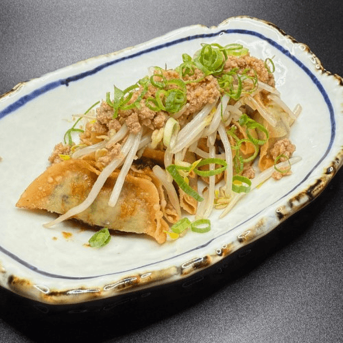 G. Ginger Sauce Gyoza.