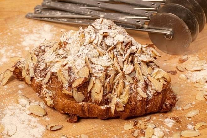 ALMOND ARTISAN CROISSANT.