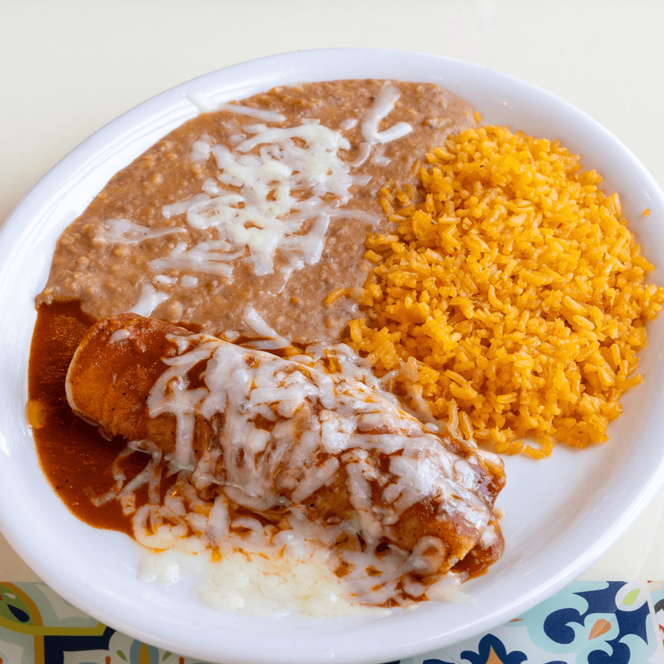 A. Un Taco De Res & Una Enchilada De Res / A. One Beef Taco & One Beef Enchilada.