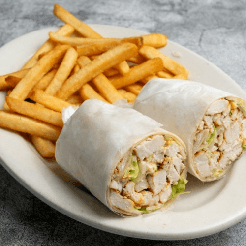 Chicken Caesar Wrap Served with French Fries.