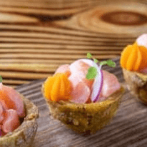 Ceviche De Salmon en Canasta De Toston.