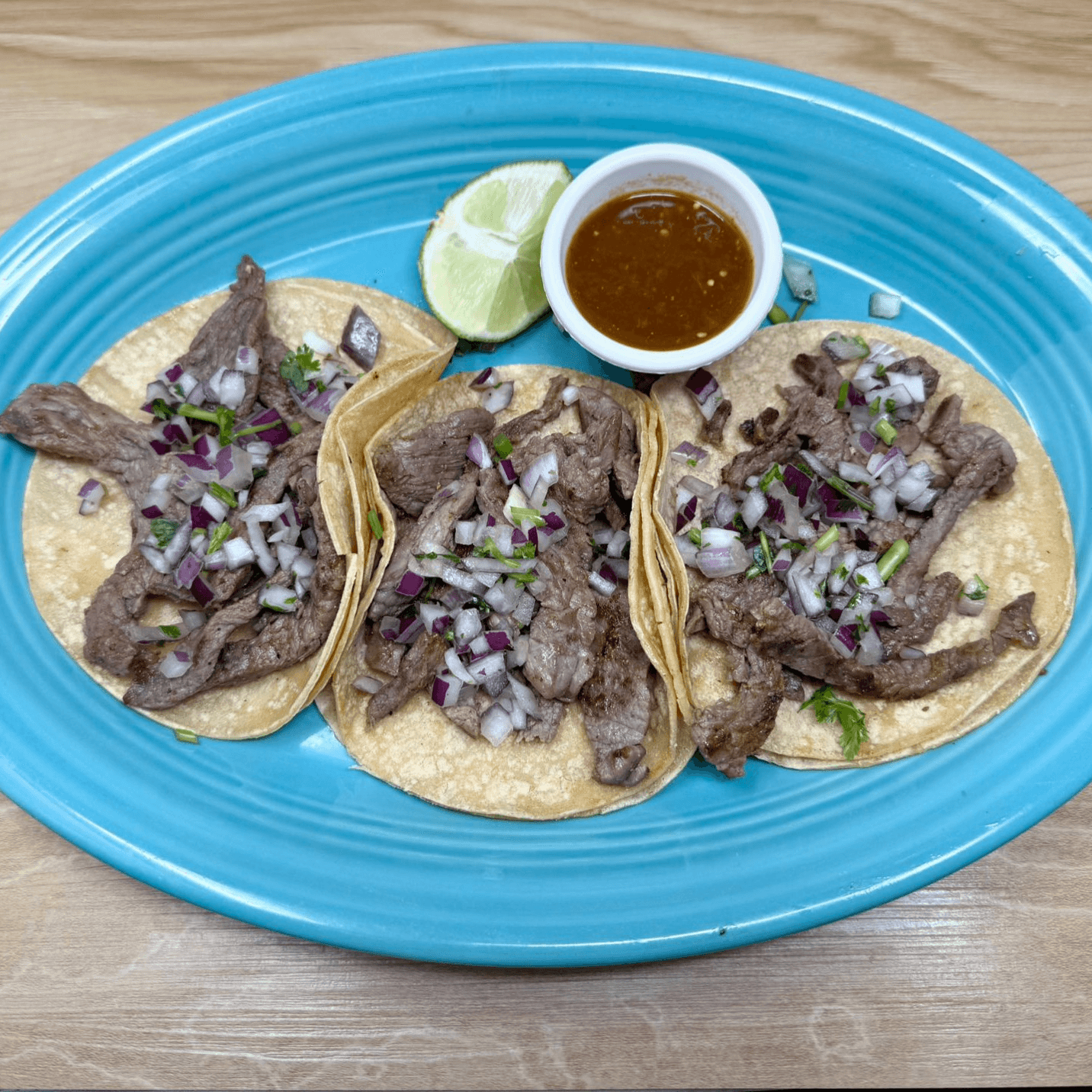 3 Tacos Carne Asada.