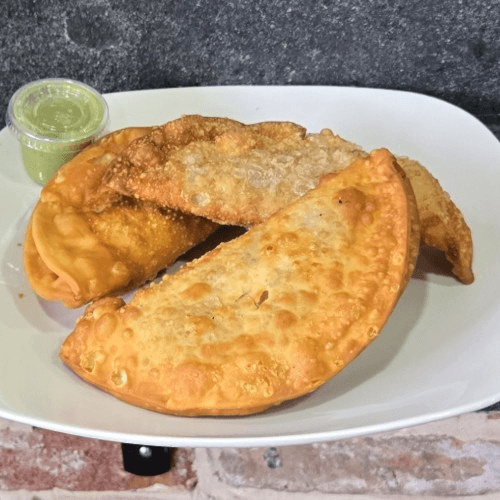 Buy 2 oxtail empanadas and get a 3rd for free!.