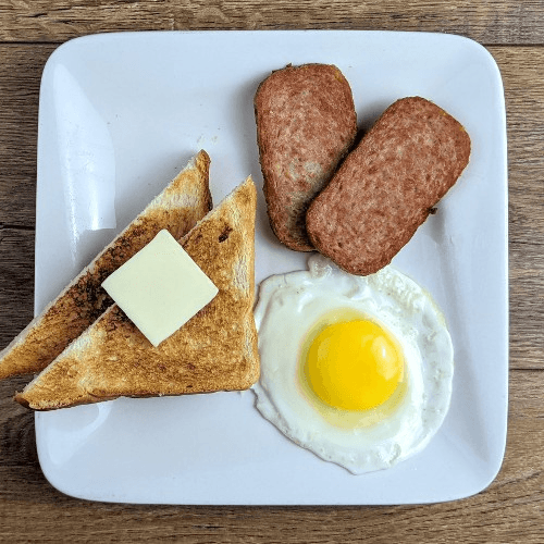 Choice of Meat, 1 Egg, Breakfast Potatoes & Toast