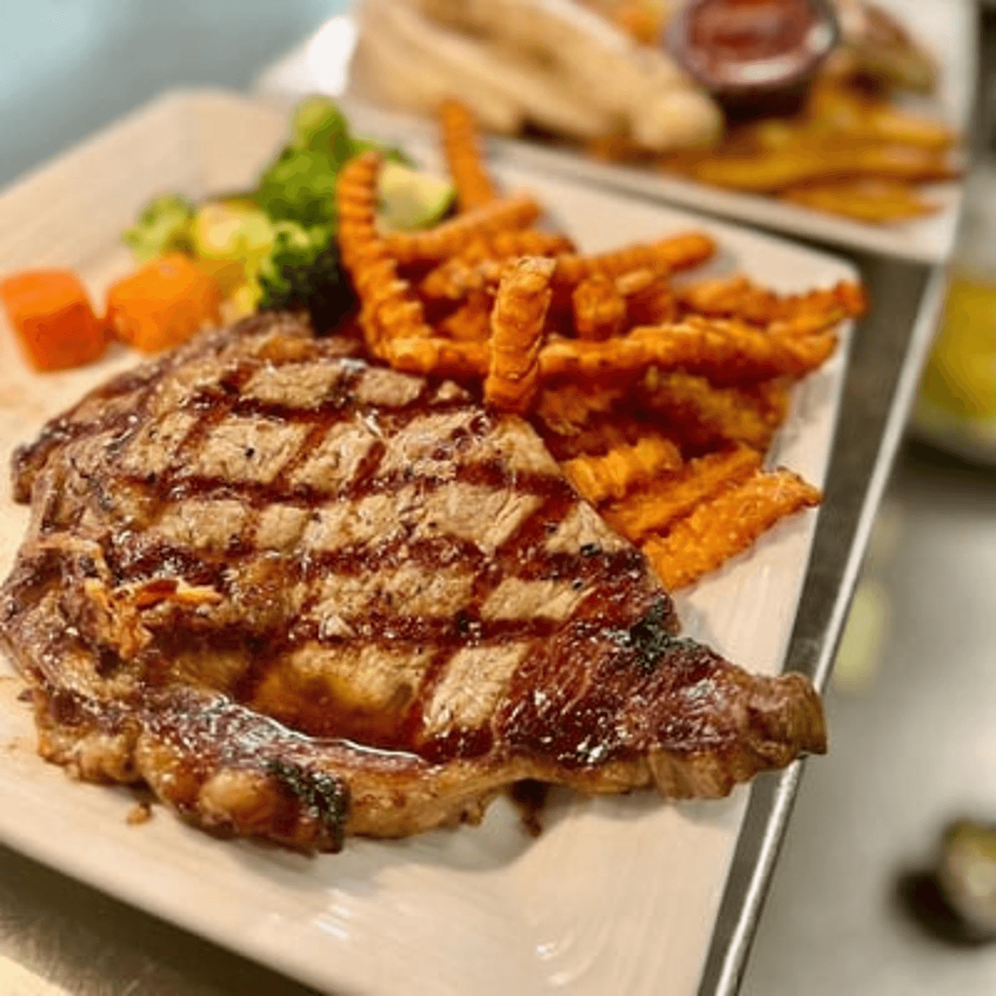 Savor the Perfection of Our Hand-Cut Ribeye!