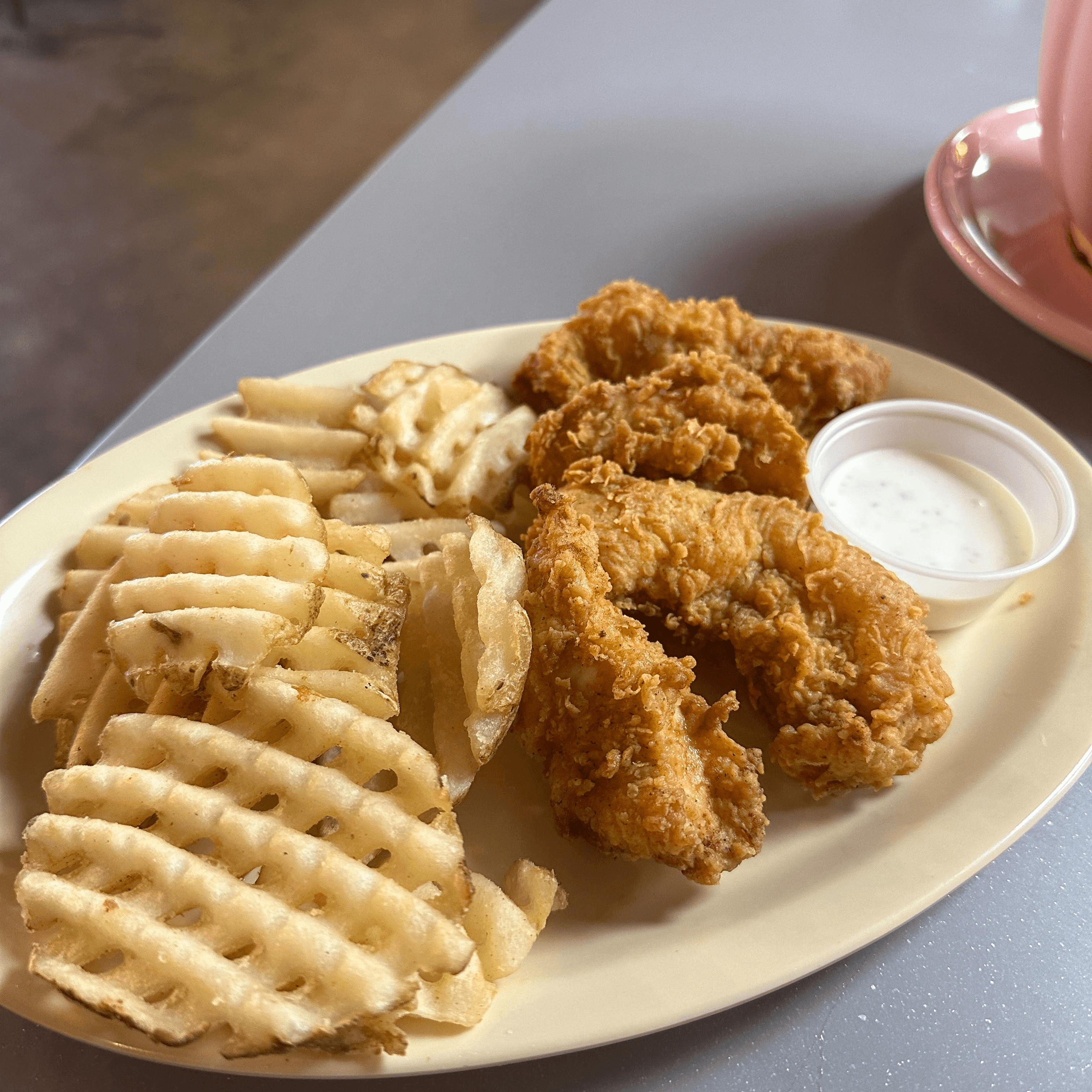 2 Pieces Chicken Strips & Fries Combo.