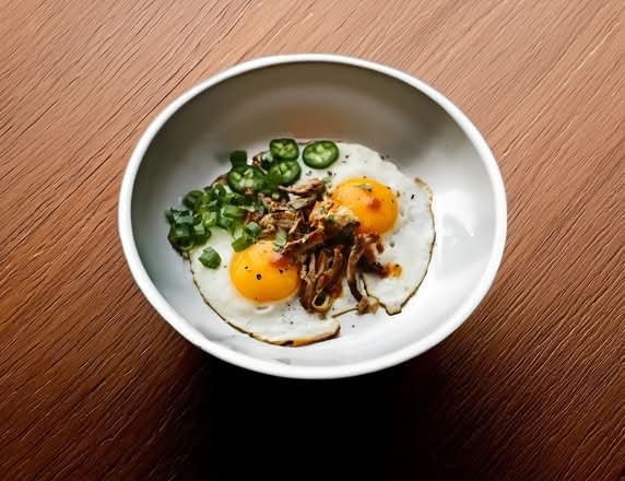 Spicy Pulled Pork Fried Eggs.