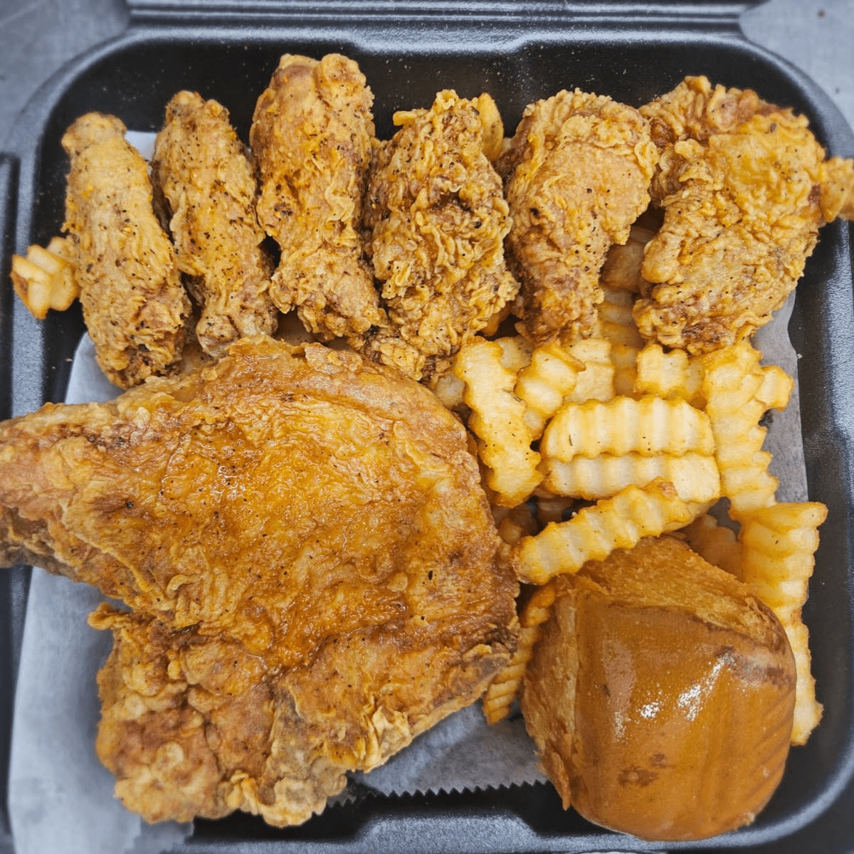 1 PORK CHOP 6 DRUMETTES W/ FRIES, ROLL, PEPPER.