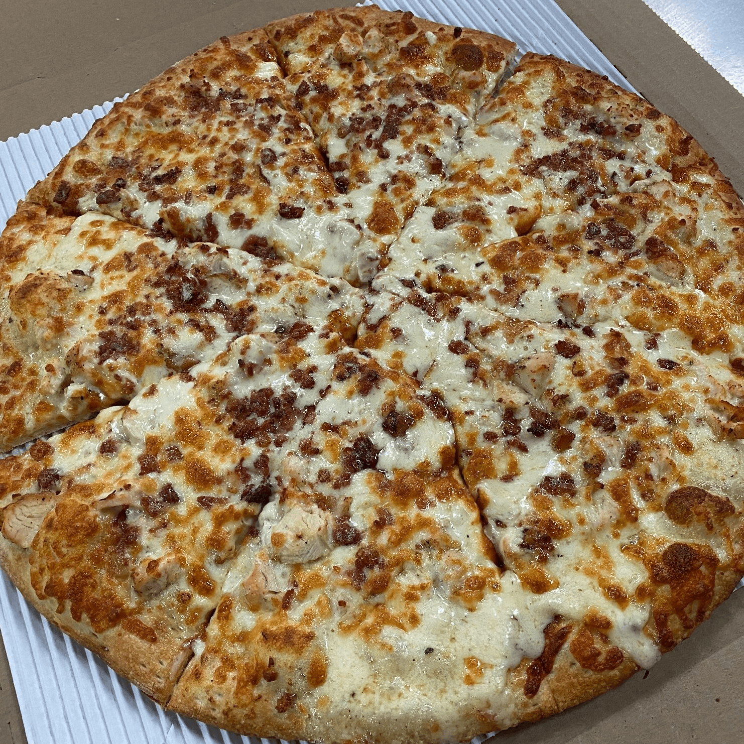 Chicken Alfredo Pizza.