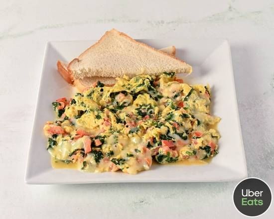 FLORENTINE EGGS WITH HOME FRIES.