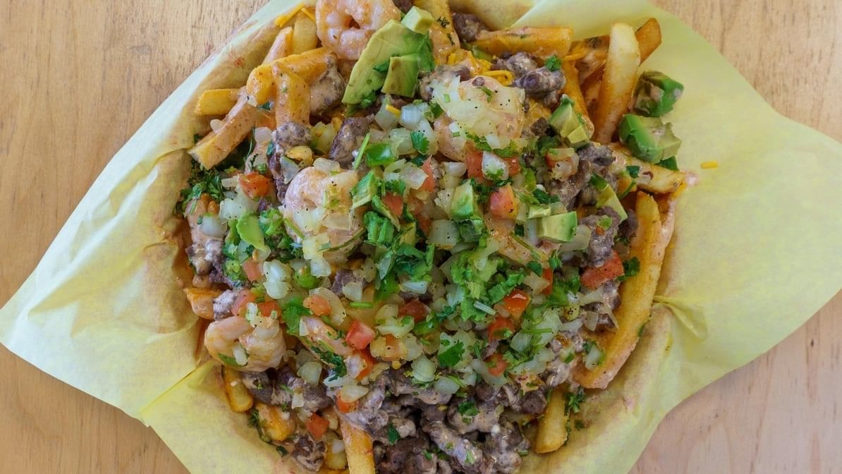 Surf-N-Turf Fries Supreme Plate.