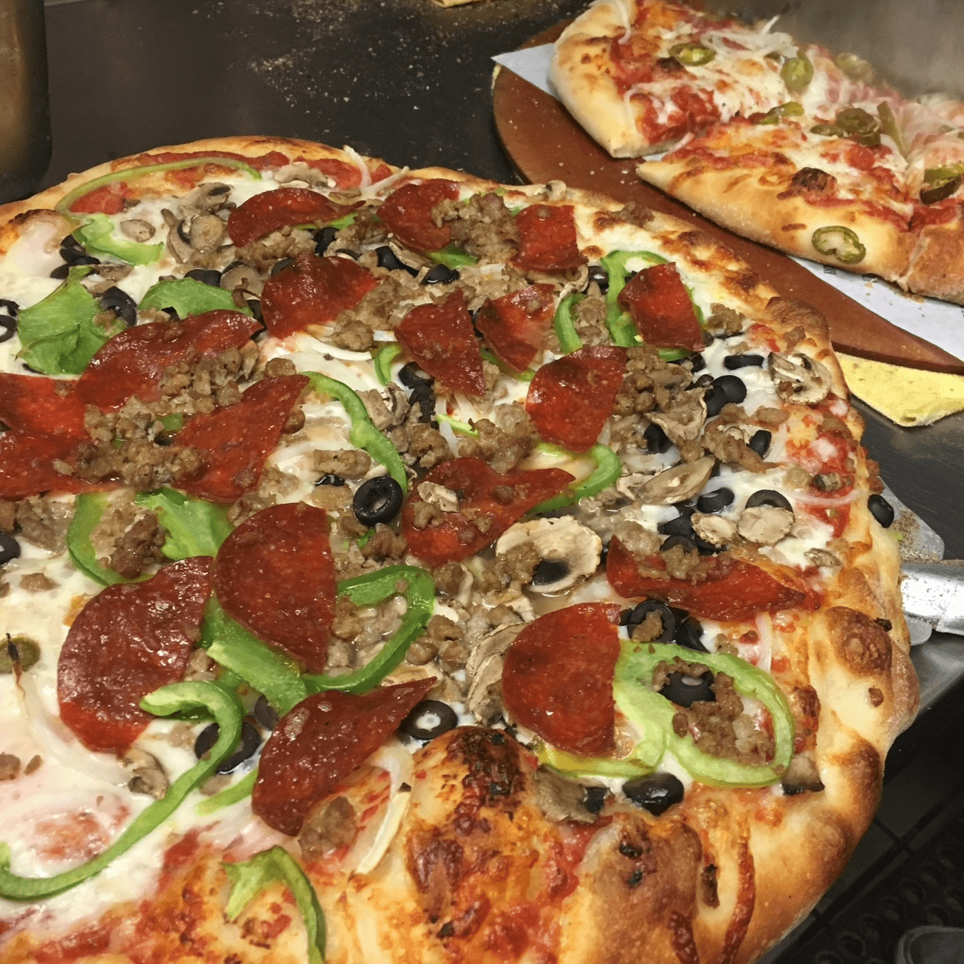 Cheese Pizza with 3+ Toppings.