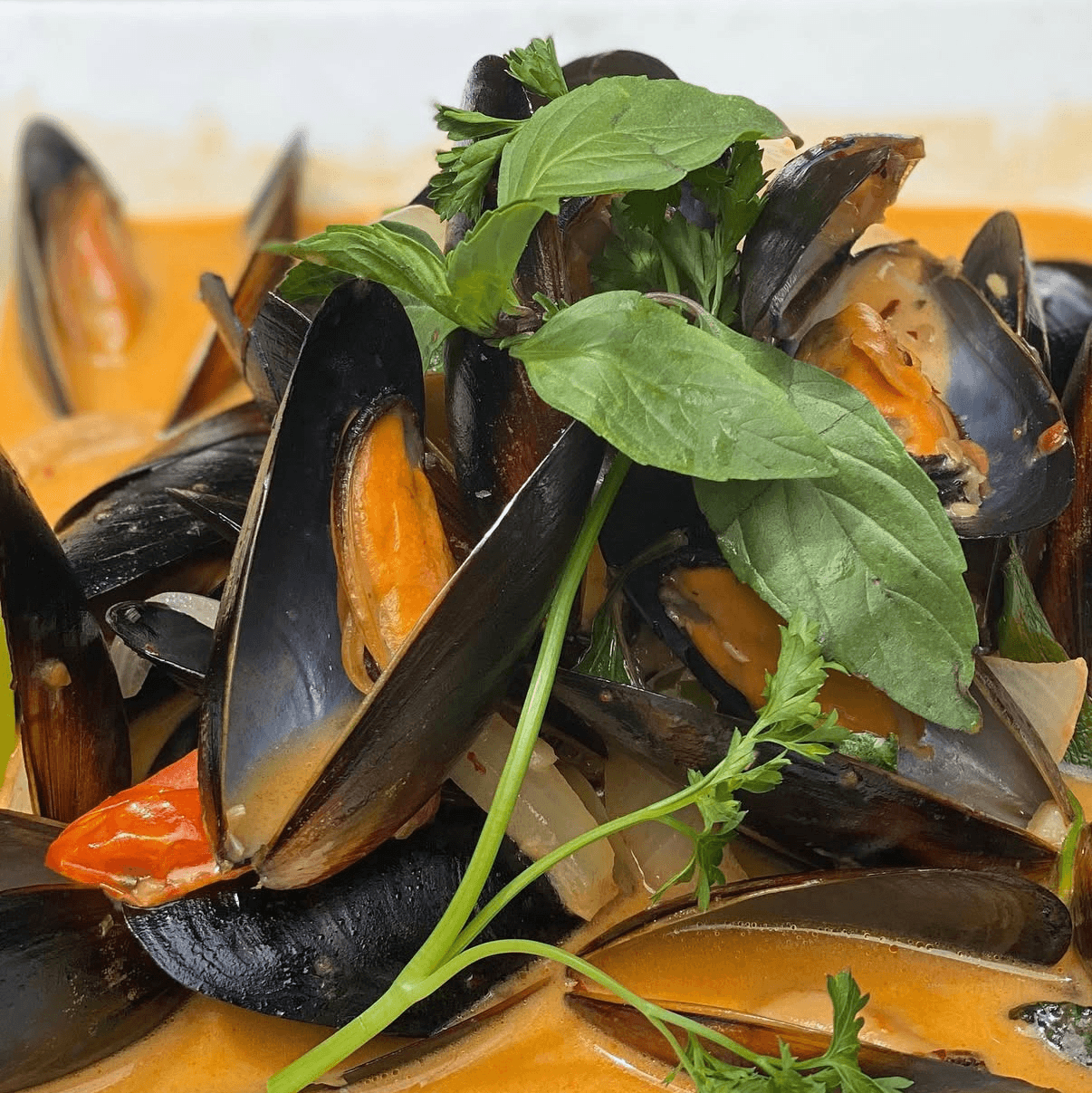 Hoi Tom Kha: Mussels in Coconut broth.