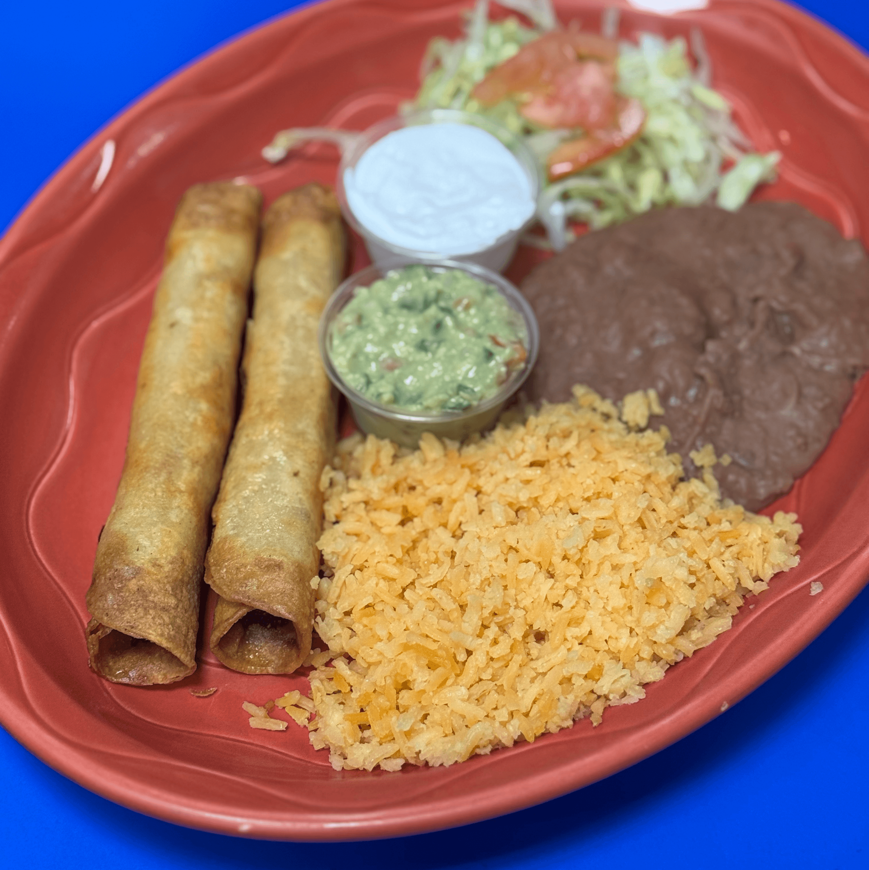 Chicken flautas lunch plate.