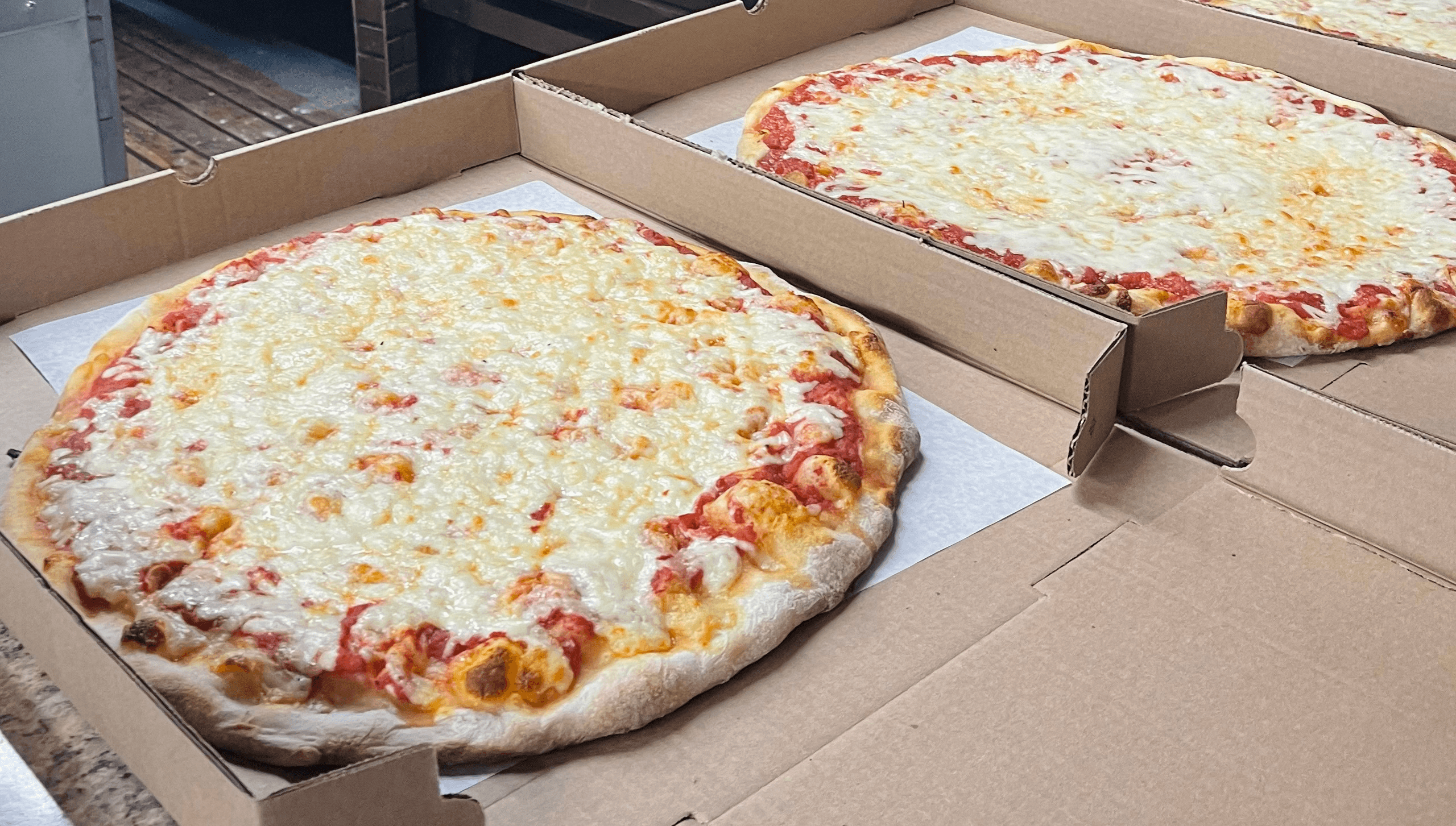 2  Lg Pie Cheese Pizza Specials.