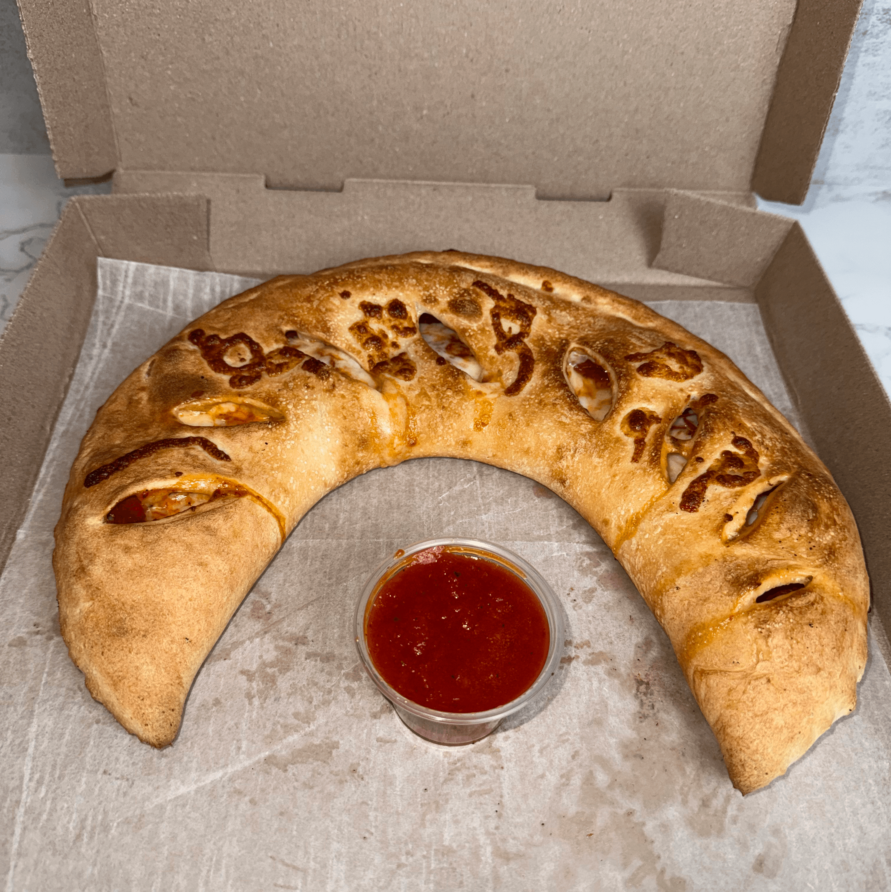 Any Regular Large Stromboli with 2 Liter Soda.