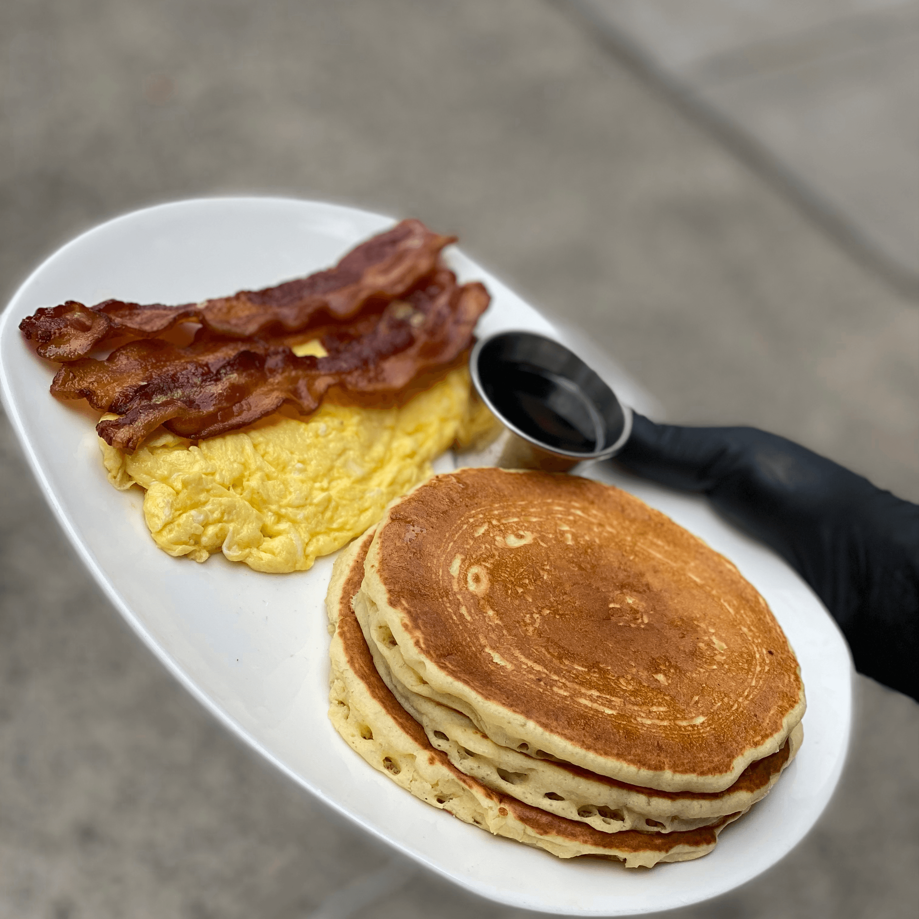Pancakes, Waffle, or French Toast Deluxe.